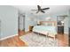 Spacious bedroom with king bed and access to patio at 1597 Franklin Way, Dunedin, FL 34698