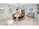 Bright dining room with wooden table and chairs at 1597 Franklin Way, Dunedin, FL 34698