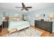 Large main bedroom with a king-size bed and plenty of closet space at 1597 Franklin Way, Dunedin, FL 34698