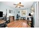 Home office with hardwood floors and plenty of storage at 1597 Franklin Way, Dunedin, FL 34698