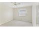 Spacious bedroom featuring a ceiling fan and neutral walls at 2243 Greenwich Dr, Sun City Center, FL 33573