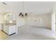 Bright dining area with access to kitchen and living room at 2243 Greenwich Dr, Sun City Center, FL 33573