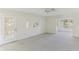 Spacious living room with access to sunroom at 2243 Greenwich Dr, Sun City Center, FL 33573