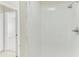 Bright, clean shower with white tile surround at 2243 Greenwich Dr, Sun City Center, FL 33573