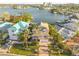 An aerial view of a house on the water, showing surrounding houses at 238 71St Ave, St Pete Beach, FL 33706