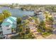 An aerial view of a house on the water, showing surrounding houses at 238 71St Ave, St Pete Beach, FL 33706