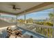 Relaxing balcony overlooking waterfront views and lush landscaping at 238 71St Ave, St Pete Beach, FL 33706