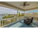 Spacious balcony with waterfront view and comfortable seating at 238 71St Ave, St Pete Beach, FL 33706