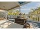 Covered deck overlooking the water, perfect for outdoor relaxation at 238 71St Ave, St Pete Beach, FL 33706