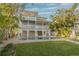 Two-story house with private pool and lush landscaping at 238 71St Ave, St Pete Beach, FL 33706