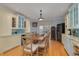 Kitchen with light wood cabinets, granite countertops and island at 238 71St Ave, St Pete Beach, FL 33706