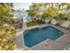 Inviting pool with brick patio and lush landscaping at 238 71St Ave, St Pete Beach, FL 33706
