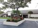 Community building with landscaping and parking at 2530 Oakleaf Ln # 31A, Clearwater, FL 33763