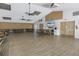 Spacious community room with tables and chairs at 2530 Oakleaf Ln # 31A, Clearwater, FL 33763