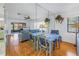Bright dining area with a small table and chairs, situated near a living room at 2530 Oakleaf Ln # 31A, Clearwater, FL 33763
