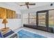 Relaxing Florida room with seating and access to outdoors at 2530 Oakleaf Ln # 31A, Clearwater, FL 33763
