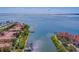 Aerial view of waterfront community with boat slips and bridge at 2741 Via Cipriani # 930A, Clearwater, FL 33764