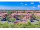 Luxury community with Spanish-style architecture and lush landscaping at 2741 Via Cipriani # 930A, Clearwater, FL 33764
