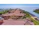 Waterfront community with multiple buildings, featuring private boat slips and resort-style amenities at 2741 Via Cipriani # 930A, Clearwater, FL 33764