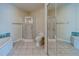 Bathroom with a large walk-in shower and tiled floor at 2741 Via Cipriani # 930A, Clearwater, FL 33764
