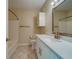 Clean bathroom with a shower/tub combo and white vanity at 2741 Via Cipriani # 930A, Clearwater, FL 33764
