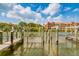 Wooden boat dock with lift and calm water at 2741 Via Cipriani # 930A, Clearwater, FL 33764