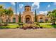 Elegant community building entrance with landscaping at 2741 Via Cipriani # 930A, Clearwater, FL 33764