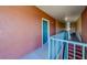 Interior hallway with teal doors and light peach walls at 2741 Via Cipriani # 930A, Clearwater, FL 33764