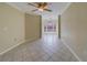 Spacious living room with tiled floors and ceiling fan at 2741 Via Cipriani # 930A, Clearwater, FL 33764