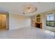 Living room featuring a fireplace and tile floors at 2741 Via Cipriani # 930A, Clearwater, FL 33764