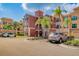 Condo building with ample parking and lush landscaping at 2741 Via Cipriani # 930A, Clearwater, FL 33764