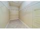 Large walk-in closet with ample shelving for storage at 2741 Via Cipriani # 930A, Clearwater, FL 33764