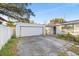 Detached single-car garage with large driveway at 3022 W Leroy St, Tampa, FL 33607