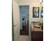 Bathroom with granite vanity and view of living room at 3562 90Th N Ter, Pinellas Park, FL 33782