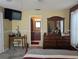 Bright bedroom with ensuite bathroom access and dresser at 3562 90Th N Ter, Pinellas Park, FL 33782