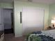 Bedroom with closet and view of hallway at 3562 90Th N Ter, Pinellas Park, FL 33782