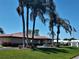 Community center with palm trees and welcoming entrance at 3562 90Th N Ter, Pinellas Park, FL 33782
