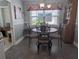 Cozy kitchen dining area with wood table and chairs at 3562 90Th N Ter, Pinellas Park, FL 33782