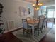 Dining room with light wood table and six chairs at 3562 90Th N Ter, Pinellas Park, FL 33782