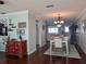 Bright dining room features hardwood floors and a chandelier at 3562 90Th N Ter, Pinellas Park, FL 33782