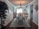 Bright dining room featuring hardwood floors and a chandelier at 3562 90Th N Ter, Pinellas Park, FL 33782