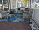 Relaxing furnished front porch with brick flooring at 3562 90Th N Ter, Pinellas Park, FL 33782