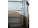 Grey garage door with opener and track visible at 3562 90Th N Ter, Pinellas Park, FL 33782