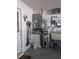 Garage with water heater, AC unit, and sink at 3562 90Th N Ter, Pinellas Park, FL 33782