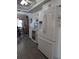 White kitchen cabinets, granite countertops, and stainless steel appliances at 3562 90Th N Ter, Pinellas Park, FL 33782