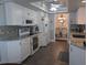 Kitchen with white cabinets, granite counters, and stainless steel appliances at 3562 90Th N Ter, Pinellas Park, FL 33782