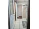 Laundry room with refrigerator, storage and door to outside at 3562 90Th N Ter, Pinellas Park, FL 33782