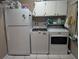 Bright laundry room, washer, dryer, and extra storage at 3562 90Th N Ter, Pinellas Park, FL 33782