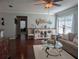 Bright living room with hardwood floors and a cozy seating area at 3562 90Th N Ter, Pinellas Park, FL 33782