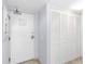 Entryway with coat closet and tiled floor at 4510 Gulf Blvd # 201, St Pete Beach, FL 33706